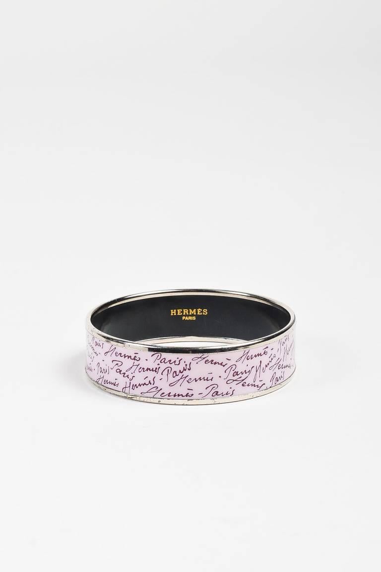 Size: 65
Color: Purple,Silver,
Made In: Austria
Fabric Content: Enamel, Palladium Metal

Item Specifics & Details: Purple bangle bracelet by Hermes. Palladium hardware and enamel construction. Features a logo printed exterior. Slides on. Comes in