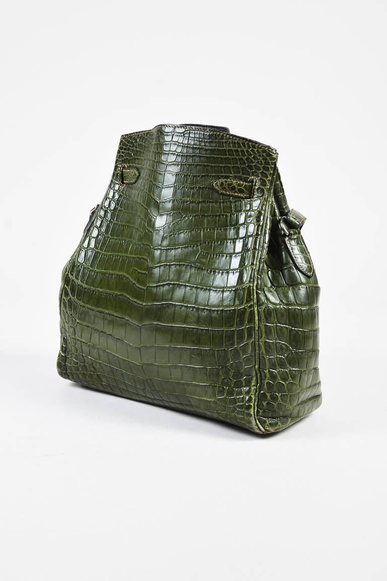 Color: Green,Vert Olive
Style: Kelly Sport 26
Made In: France
Fabric Content: Crocodile Niloticus Matte; Lining: Linen

Item Specifics & Details: The 