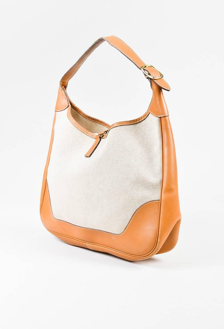 Color: Beige,Brown,Gold,
Style: Trim
Made In: France
Fabric Content: Box Calf Leather, Canvas
Item Specifics & Details: VINTAGE 