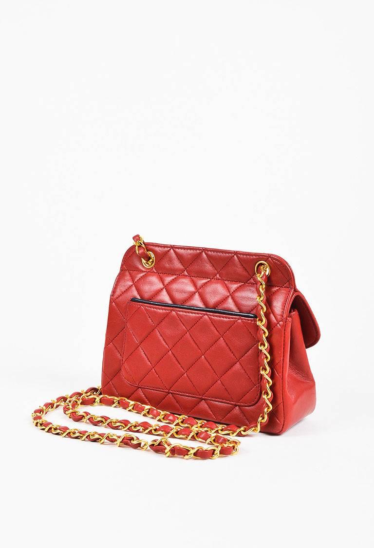 Color: Gold,Red,
Made In: France
Fabric Content: Lambskin Leather

Item Specifics & Details: Lambskin leather bag featuring iconic quilting, a flap front with an interlocking 'CC' twist-lock closure, a chain-leather crossbody shoulder strap,