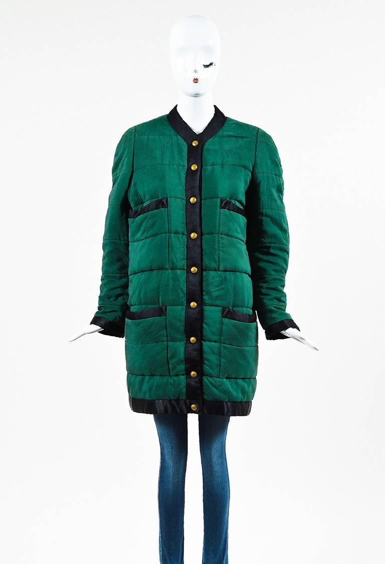 Size: Unknown. Please see measurements.
Color: Black,Gold,Green
Made In: Unknown
Fabric Content: Appears to be silk, but cannot confirm

Item Specifics & Details: Bi-color coat featuring a stand collar, 'CC' buttons down the front, four front