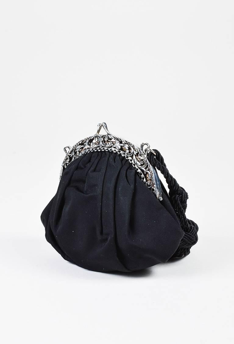 Color: Black,Silver,
Made In: Italy
Fabric Content: Satin, Sterling Silver

Item Specifics & Details: Satin mini bag featuring a doubled rope shoulder strap, elegant gathers radiating from the topline, and a sterling silver kiss-lock frame