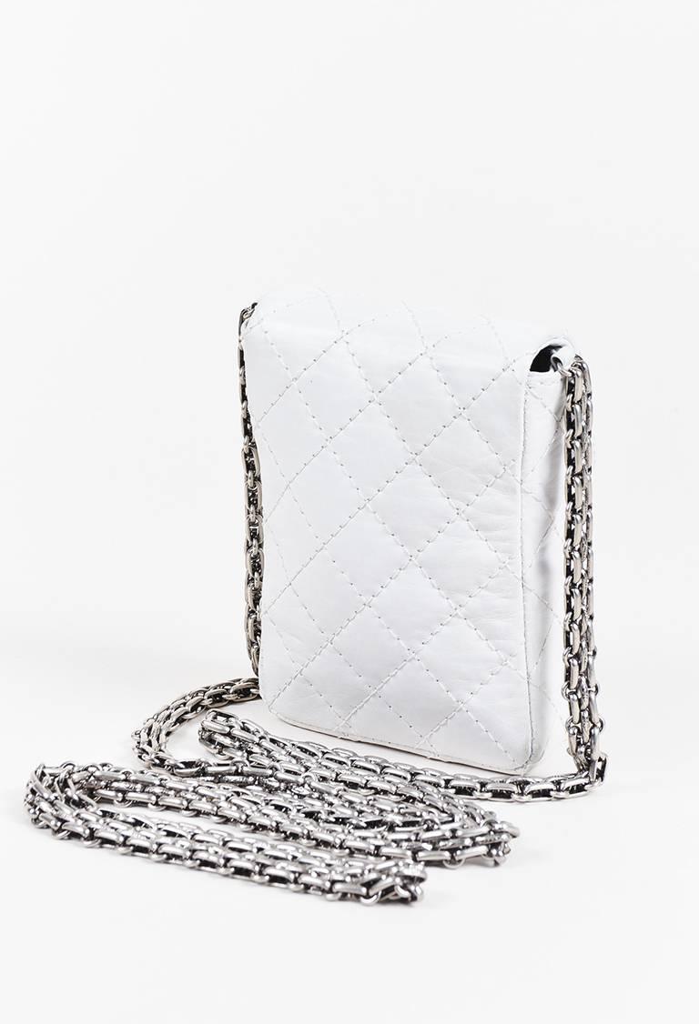 Color: Silver,White,
Made In: France
Fabric Content: Leather

Item Specifics & Details: White crinkled calfskin leather 