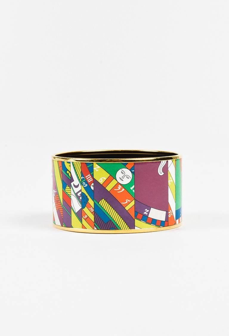 Size: 65
Color: Green,Multicolor,Orange,Purple,
Made In: France
Fabric Content: Gold Plated Metal, Enamel
Item Specifics & Details: Circa 2013. Bold bangle to add a unique finishing touch. Gold plated metal. Glossy enamel coating. Wide band.
