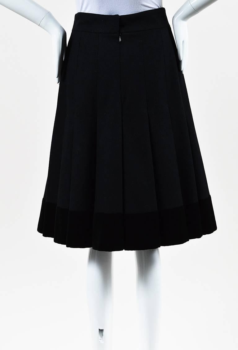 black pleated flare skirt