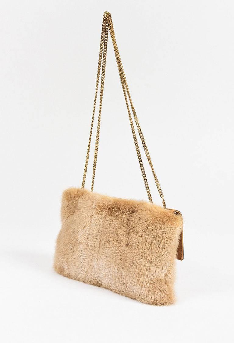 Color: Brown,
Made In: Italy
Fabric Content: Exterior: Genuine Mink, Ostrich; Interior: Textile

Item Specifics & Details: From the Tom Ford era. Luxurious ostrich leather and plush mink fur construction. Gold-tone hardware. Top double chain strap.