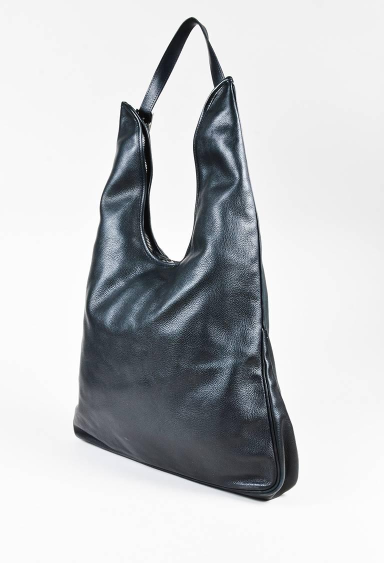 Color: Black,
Made In: France
Fabric Content: Leather

Item Specifics & Details: The 