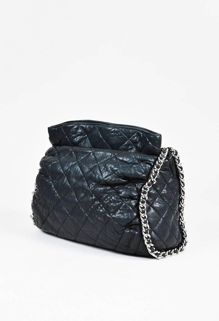 Color: Black,
Made In: Italy
Fabric Content: Leather; Lining: Textile

Item Specifics & Details: Black lambskin leather quilted 