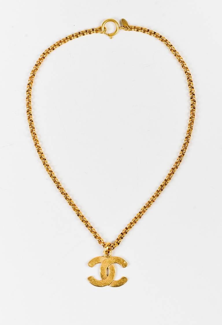 Vintage gold tone metal chain link necklace from Chanel's Season 29 circa 1992. 'CC' pendant. Spring-ring closure. Comes with box.

Made in: France
Color: Gold
Content: Gold Tone Metal
Condition: Pre-owned. Slight residue and small scratches.

Total