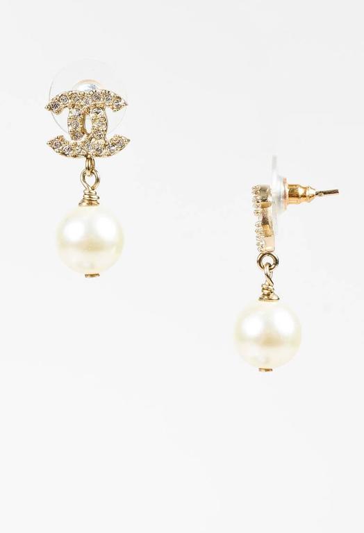 Chanel Gold Tone Faux Pearl Crystal Embellished 'CC' Drop Earrings For
