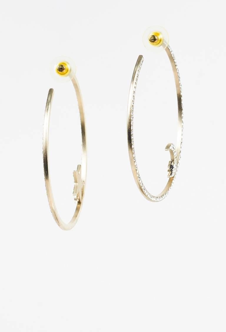 Chanel 08P Gold Tone Crystal Embellished Star Moon 'CC' Hoop Earrings In Excellent Condition For Sale In Chicago, IL