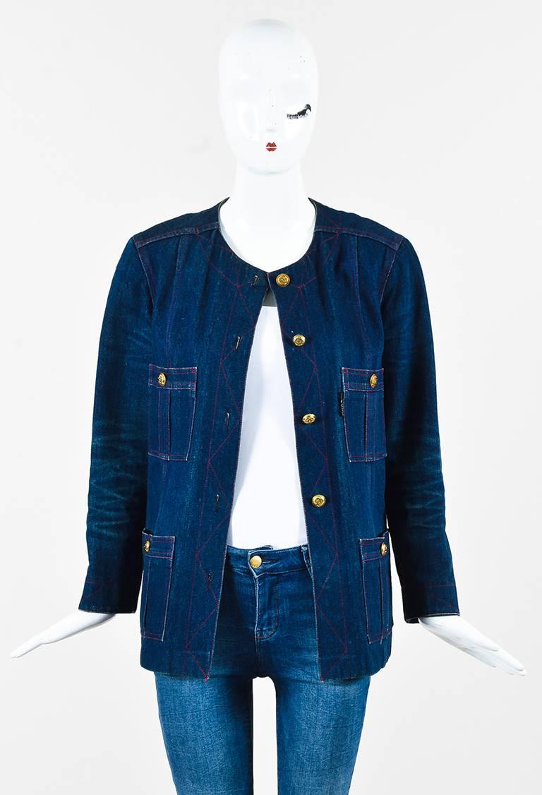 Vintage Chanel Boutique denim jacket featuring gold-tone 'CC' buttons down front, contrasted stitching, four front pockets, and three-quarter length sleeves.

Size: Unknown
Color: Blue,Red,
Made in: Unknown
Fabric Content: Appears to be cotton, but