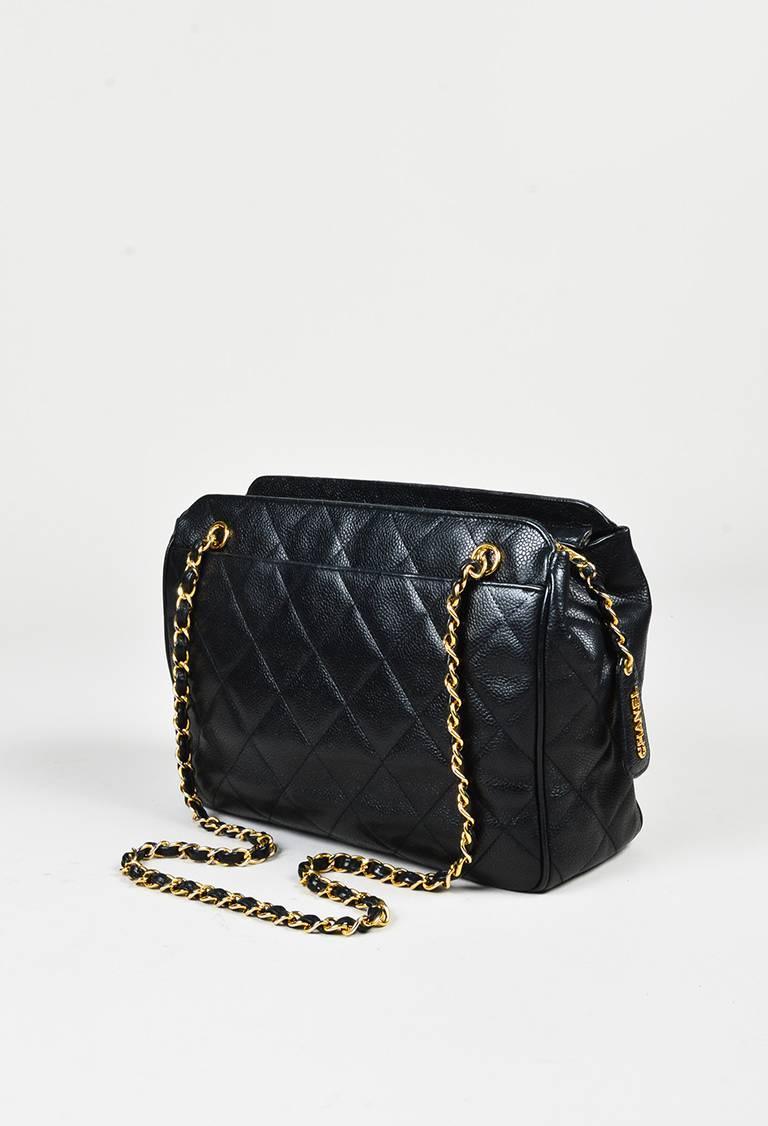 Vintage Chanel shoulder bag from 1996-1997. Signature caviar leather exterior. Gold-tone hardware. Diamond quilted stitching. Front 'CC' turnlock plaque. Leather woven chain straps. Front and back flat compartments. Top zip closure. Interior zip