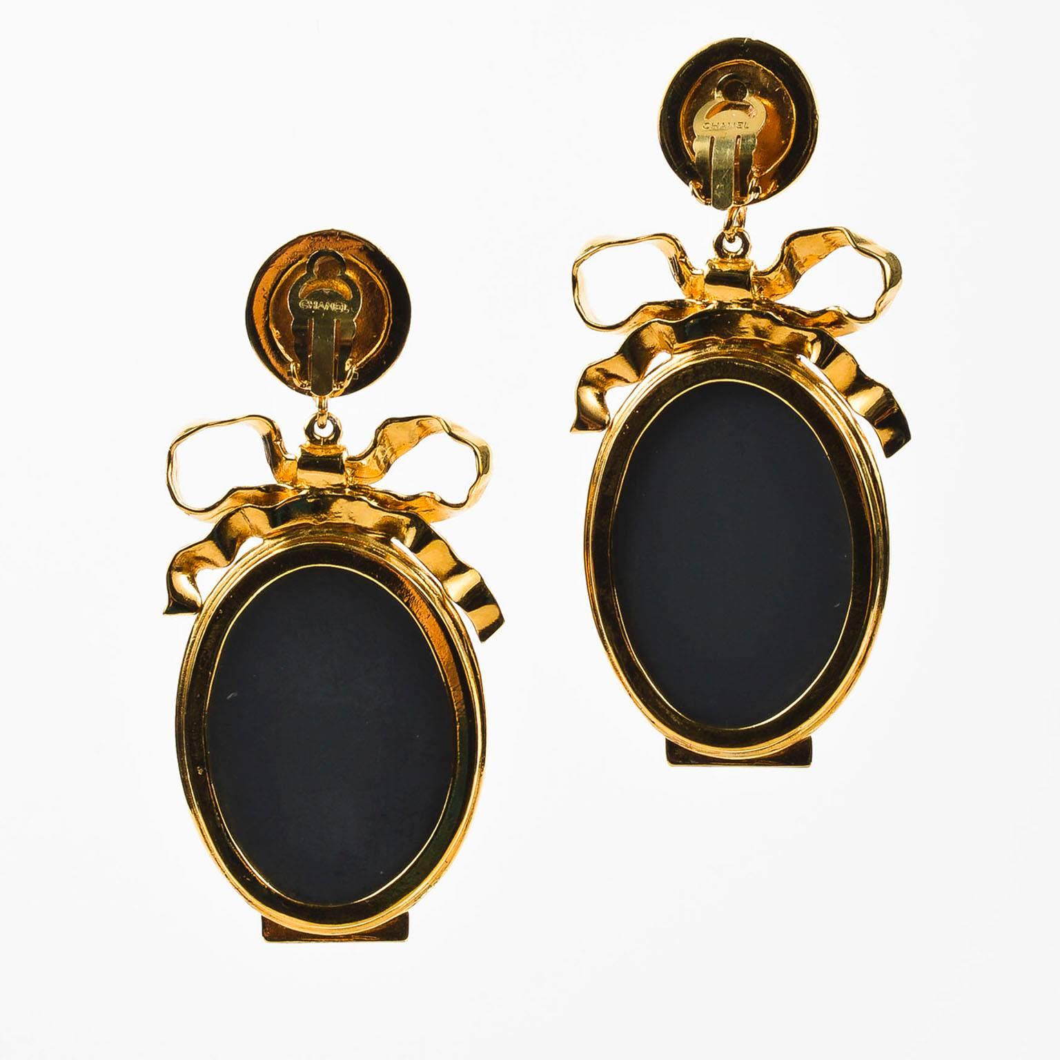 Vintage Chanel statement earrings, design circa 1970's. These oversized, whimsical earrings are an instant conversation starter, guaranteed to by envied by the most fashionable trendsetters. Wear alone to let them take center stage or pair with a