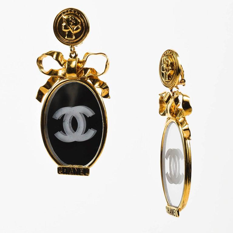 Vintage Chanel Gold Tone Mirror 'CC' Bow Oversized Clip On Statement  Earrings For Sale at 1stDibs