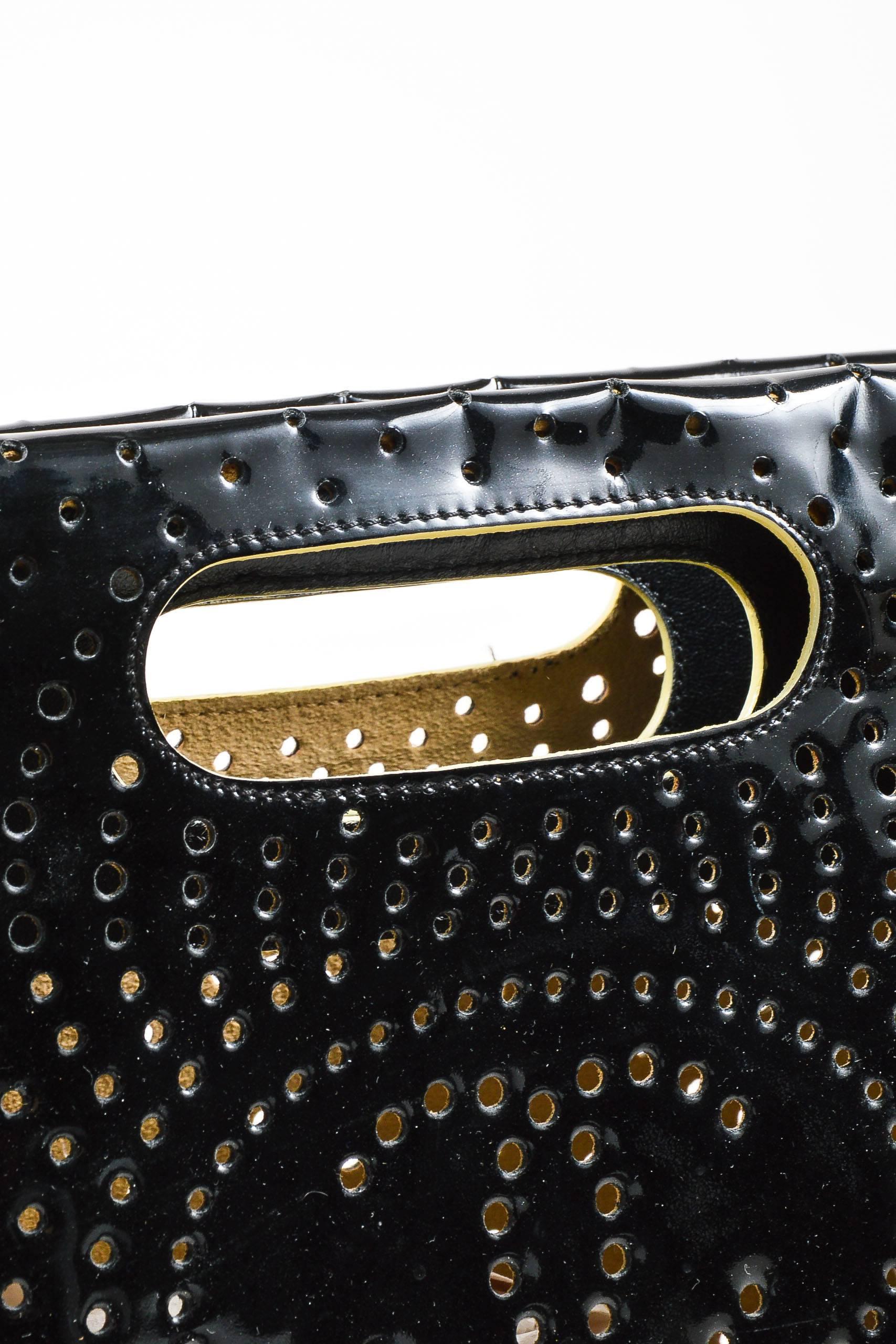 Chanel Black Perforated Patent Leather 'CC' Logo Clutch Handbag In Good Condition For Sale In Chicago, IL