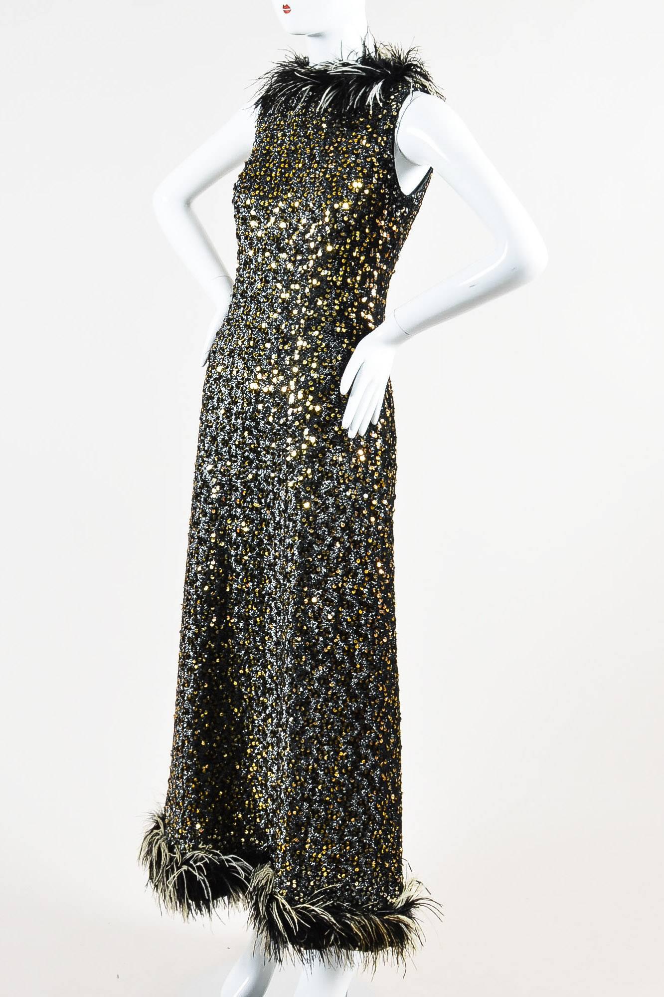 Vintage statement gown for that special night out on the town. Crew neck. Full length. Metallic threading throughout. Multicolor sequin embellishment throughout. Feather trim around neck and hem. Hidden back zip closure with hook-and-eye closure.