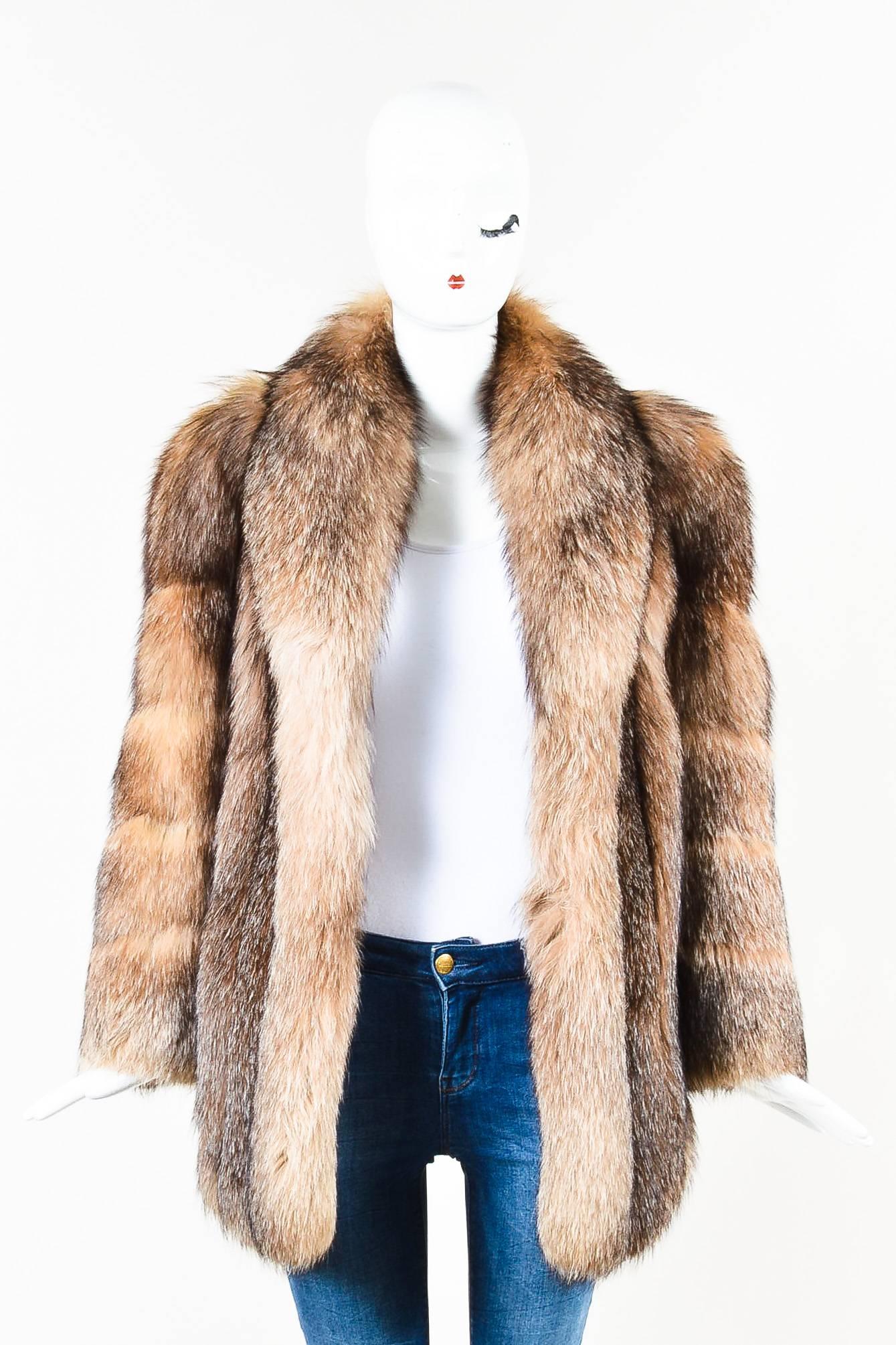 Vintage Lanvin at the Evans Collection luxurious and plush fur coat in multicolor tawny brown. Shawl collar. Long sleeves and shorter length for more modern fit. Fully lined and hook-and-eye closure.

Measurements:
Total Length: 30