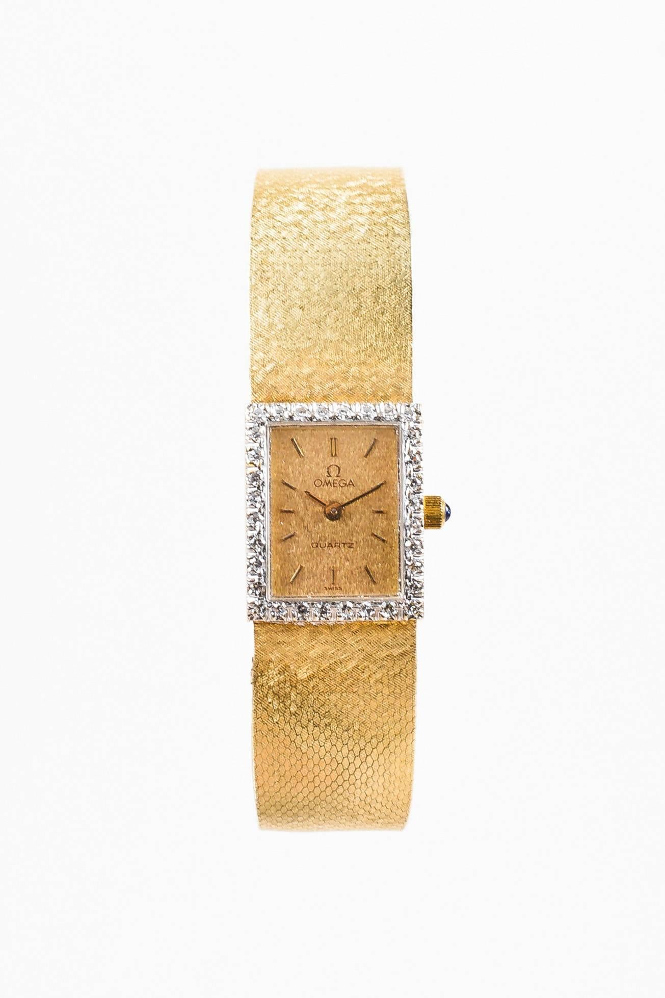 Fabric Content: 14K Yellow Gold, Diamond, Blue Spinel Cabochon

Item Specifics & Details: Retails at $3995. Elegant vintage watch features a 14k yellow gold band with two setting closure. Rectangular case is detailed with a row of diamonds