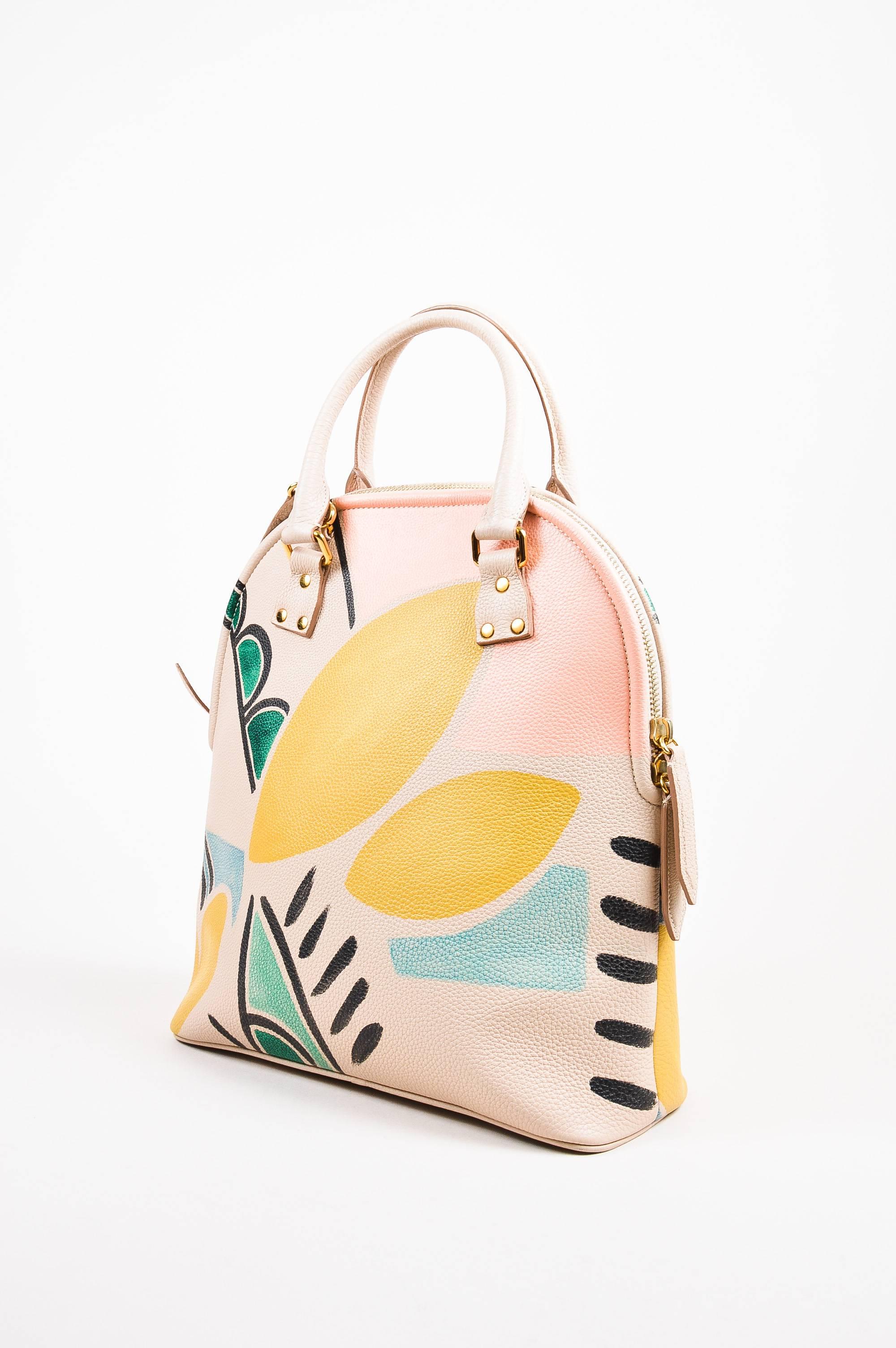 From the 2014/2015 Collection. Retails at $3,995. Beige, pink, green, black, and yellow hand painted pebbled leather 