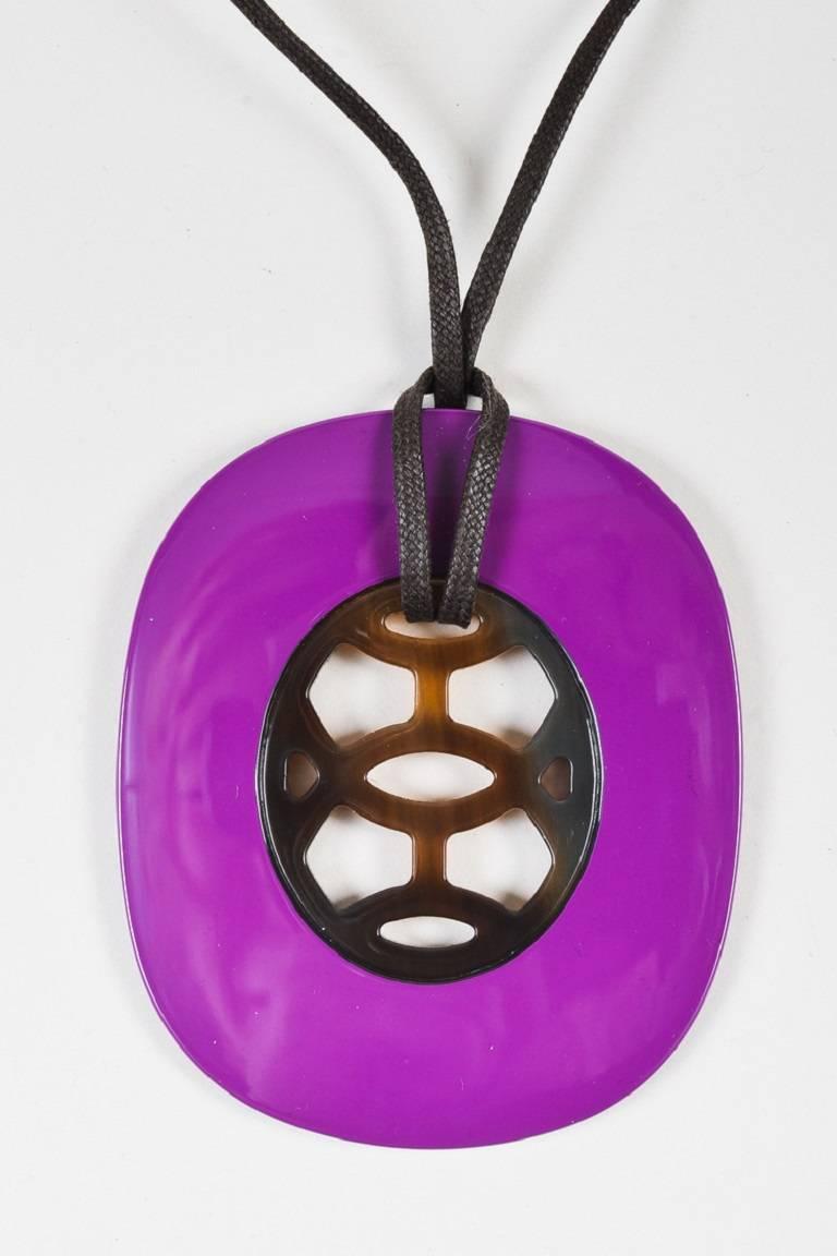 Color: Brown,Purple,
Made In: Vietnam
Fabric Content: Lacquered Buffalo Horn; Waxed Cotton Cord
Item Specifics & Details: Comes with box and dust bag. Purple and brown lacquered wax horn pendant 