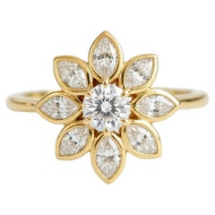 Bague en or jaune 14 carats avec une fleur de marguerite en moissanite