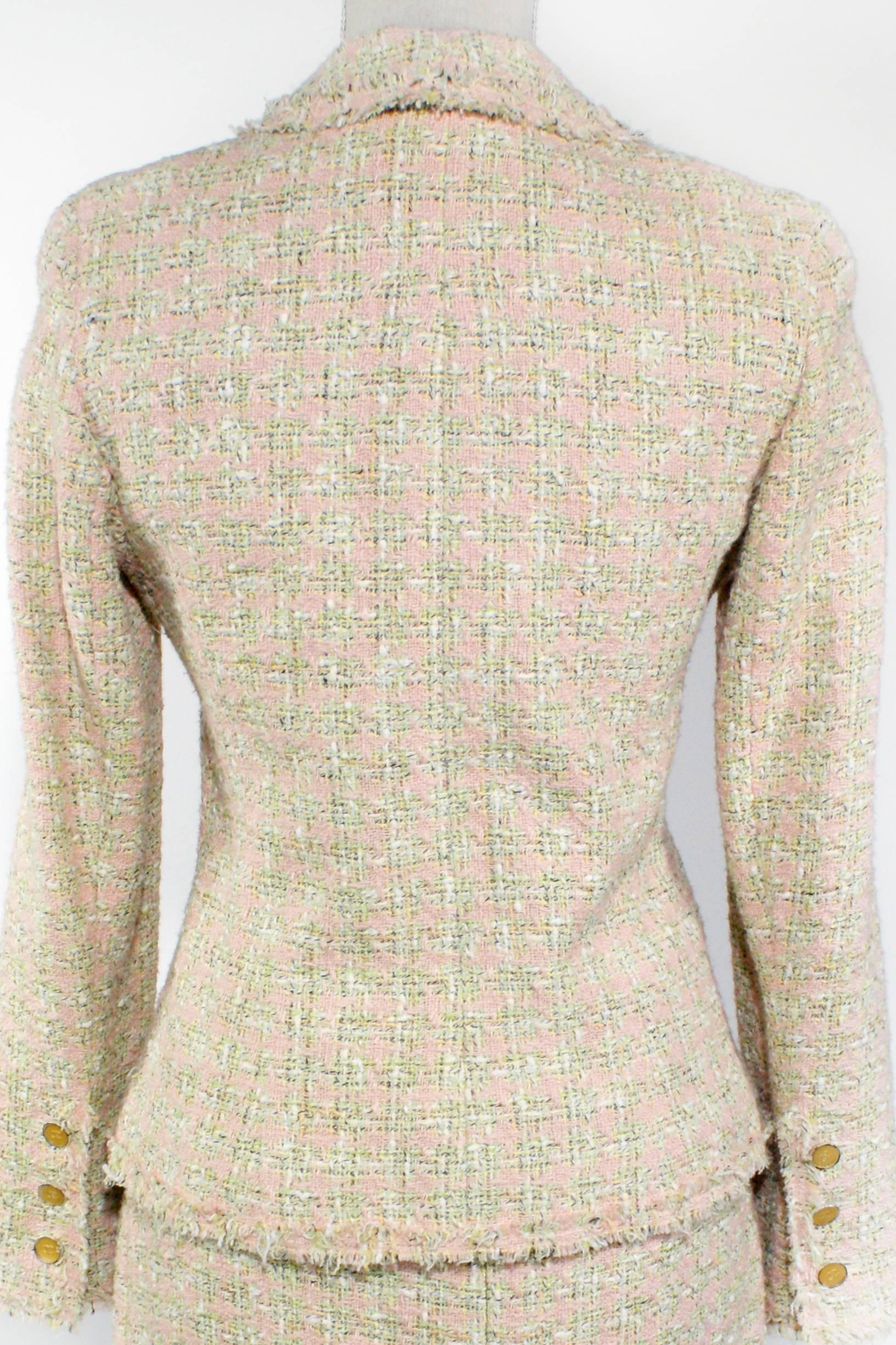 A classic Chanel ensemble 
Colors: Pink, Green, Cream
Golden logo buttons
Faux pockets
Size 38
