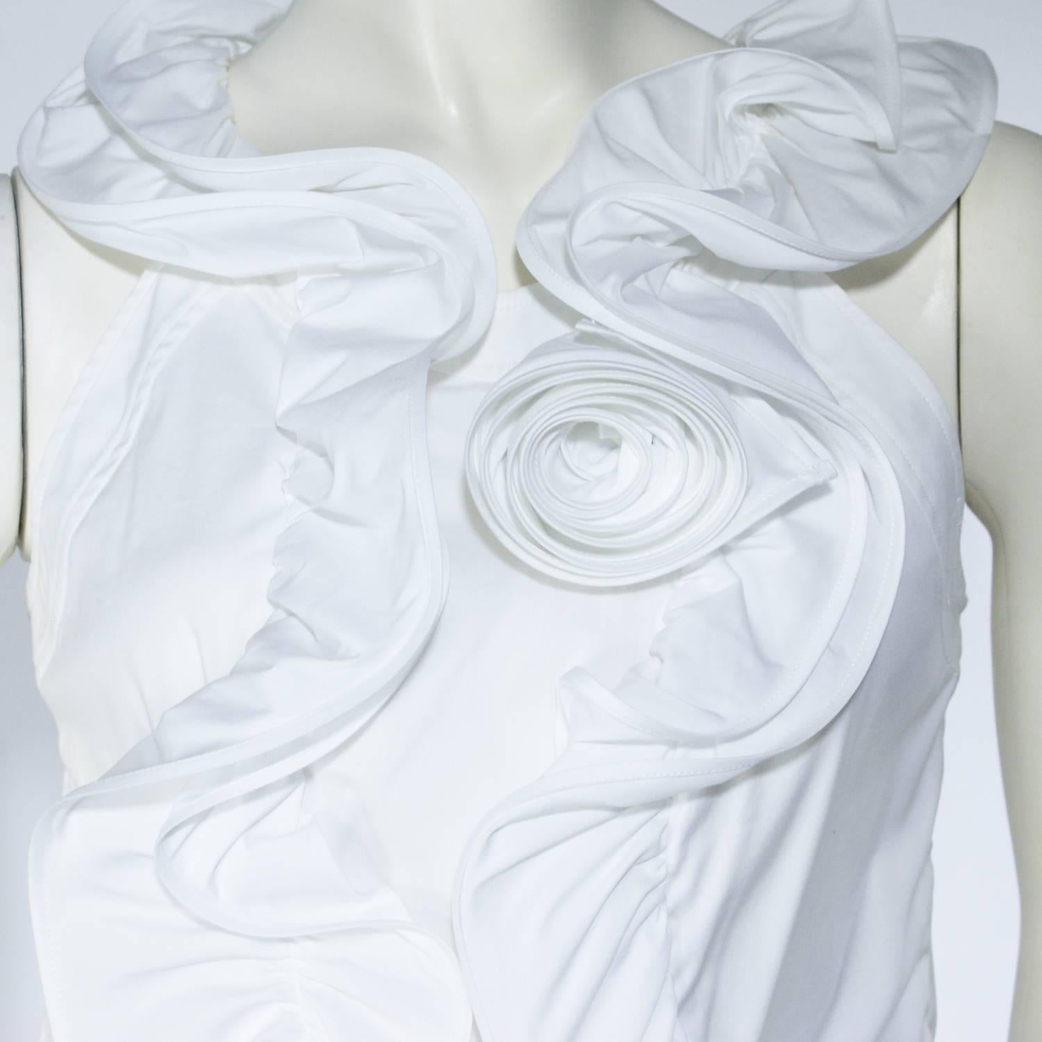 Ruffle detail down the front
Floral ruffle design
Sleeveless top
New with tags 
Originally $$690.00

