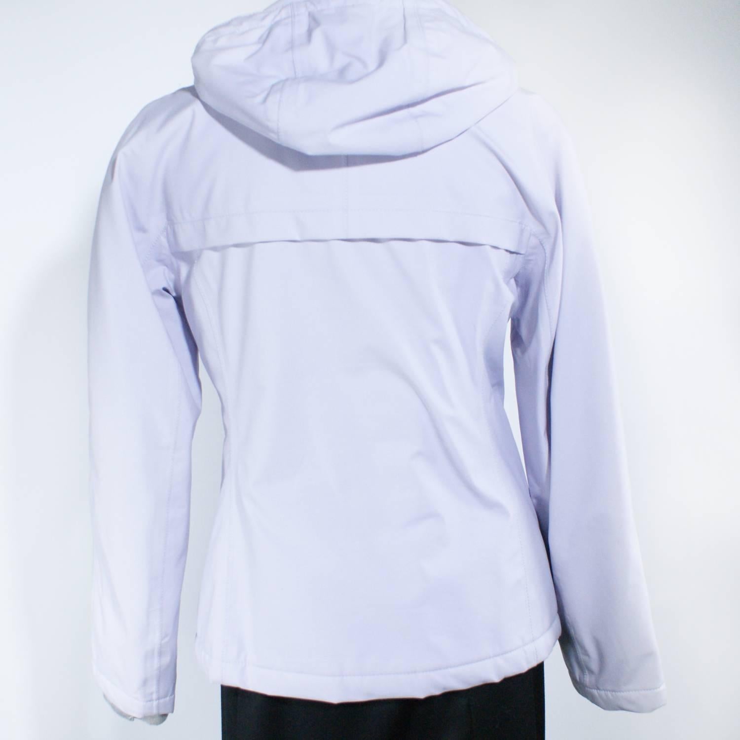 Lavender colored Prada jacket 
Crafted in sports Gore-Tex 
Zip closure 
Zip pockets
Hood
Size 38