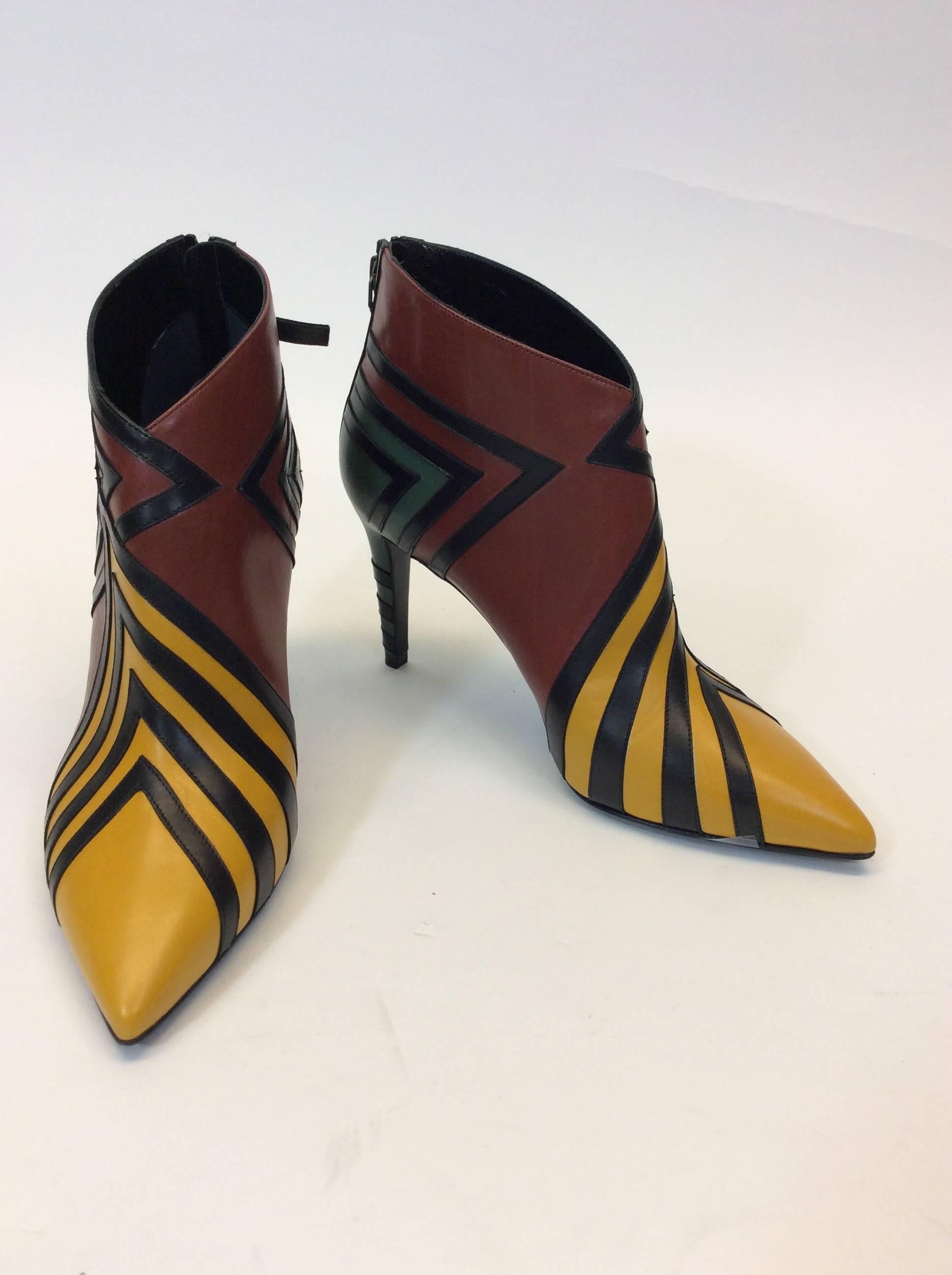 Pierre Hardy Genuine Leather Bootie 
Multi Colored Pattern with Black Details
Zipper On back of Ankle 
Hand Made In Italy
Never Before Worn
3.5” Inch Heel
3” Inch Sole