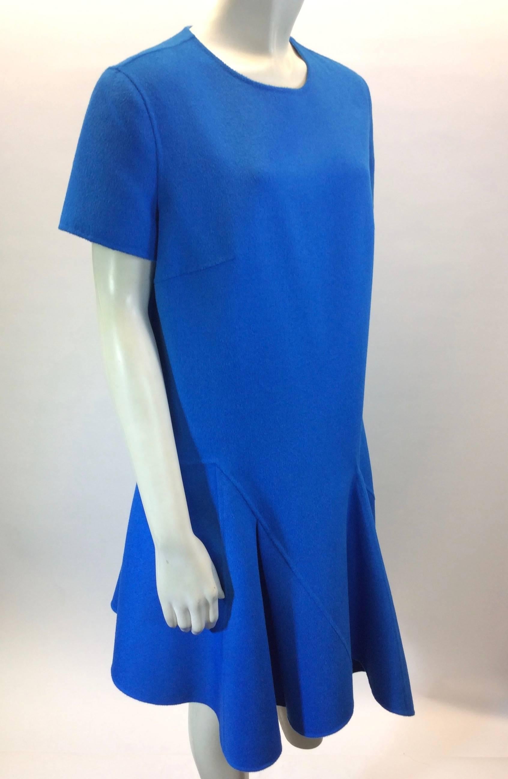 Christian Dior Dress
- 60% wool, 40% Angora
-NWT Original price: $3,300
-Size T44W. US Size 12
-Flare hem