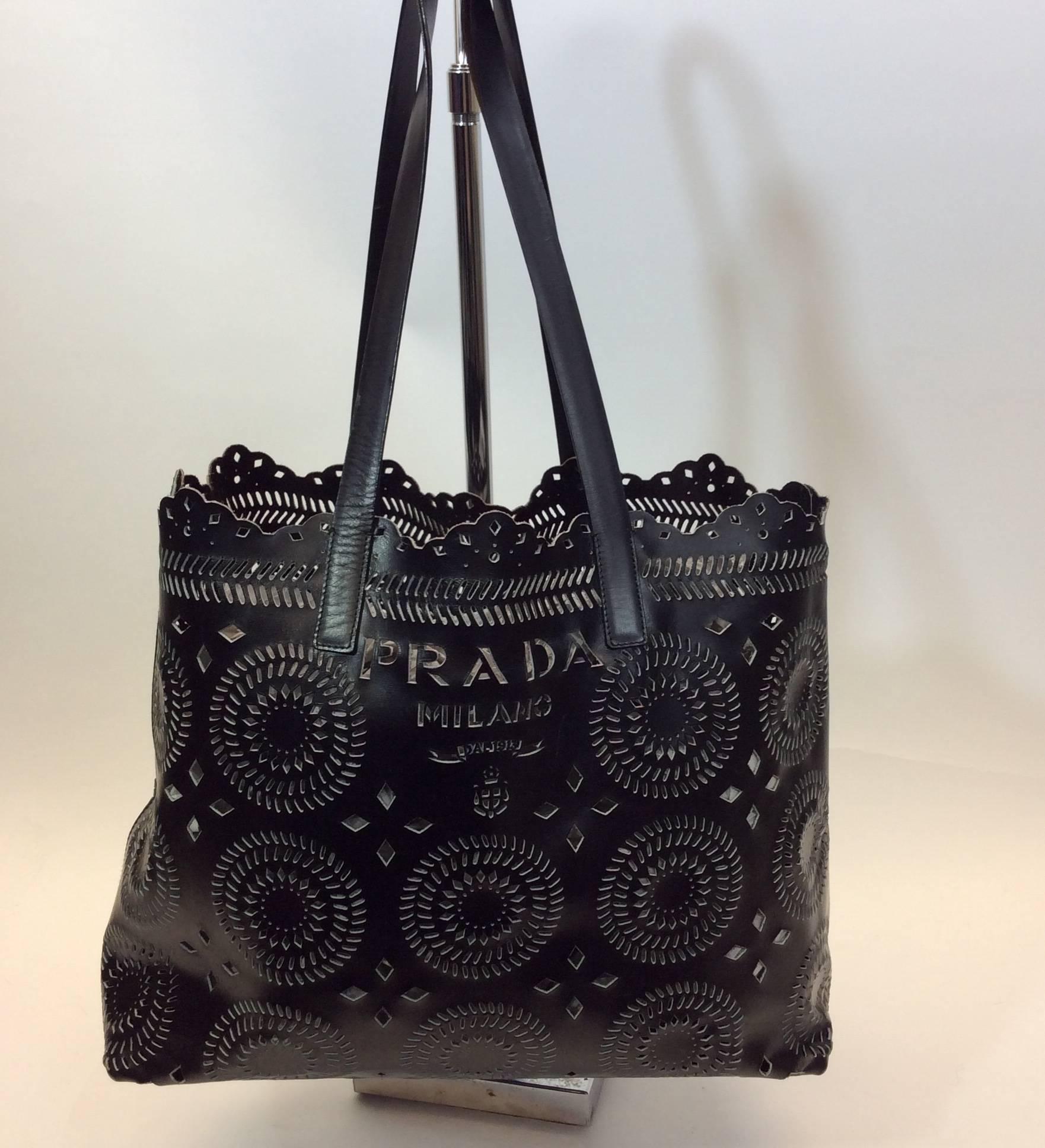 Black Mandala Laser Cut Tote Bag
13 inches tall, 15.5 inches wide, 6 inches deep
11 inch strap drop
Includes interior zip pouch
Perforated mandala designs in leather
