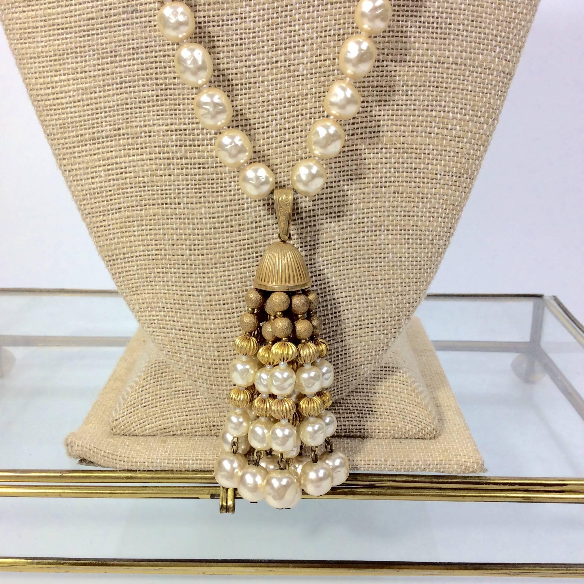 Miriam Haskell Brass and Pearl Tassle Necklace with a 20 inch drop.