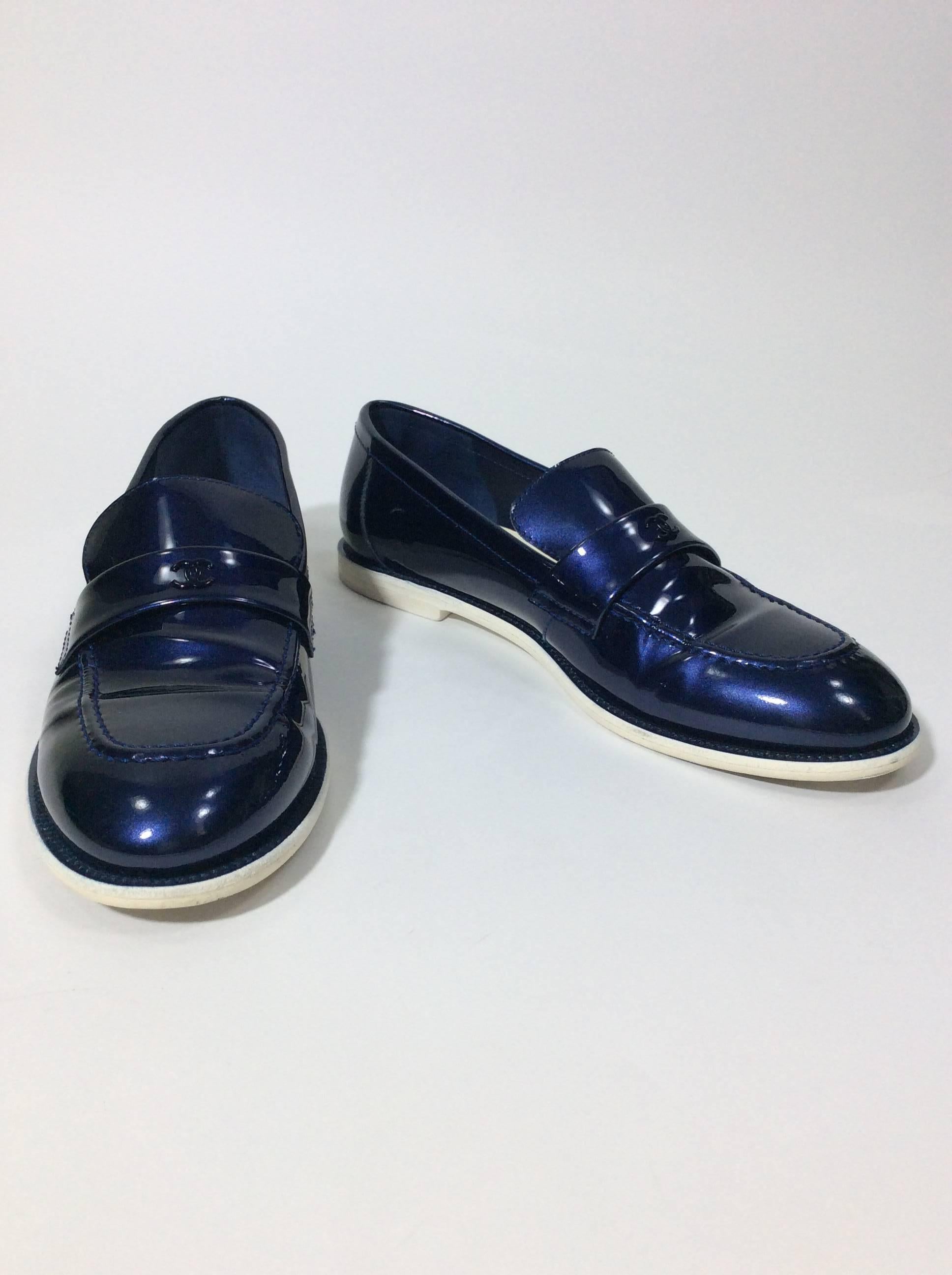 Patent Leather Midnight Blue Loafer
CC Emblem on Shoe Strap
3.75" Inch Sole Width
Size UK 39.5 (Equates to US 8-9)
