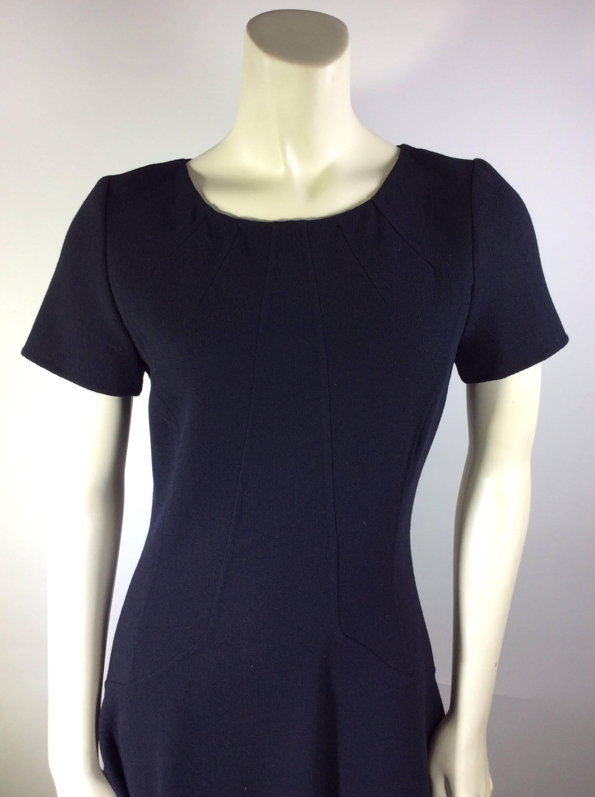 Oscar de la Renta Short Sleeve Navy Dress
Mid Length Bottom
100% Wool
100% Silk Lining
New, Never Before Worn
