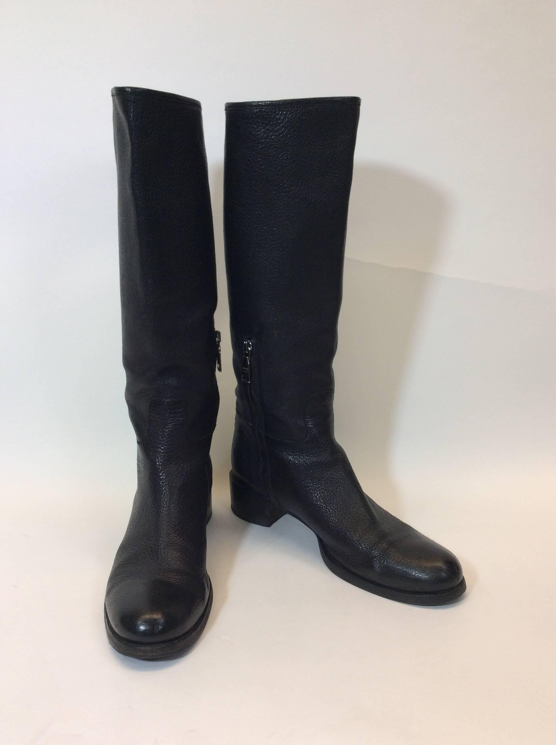 Black Leather Knee High Boots
Small Silvertone Zipper on inner Ankle
1.5