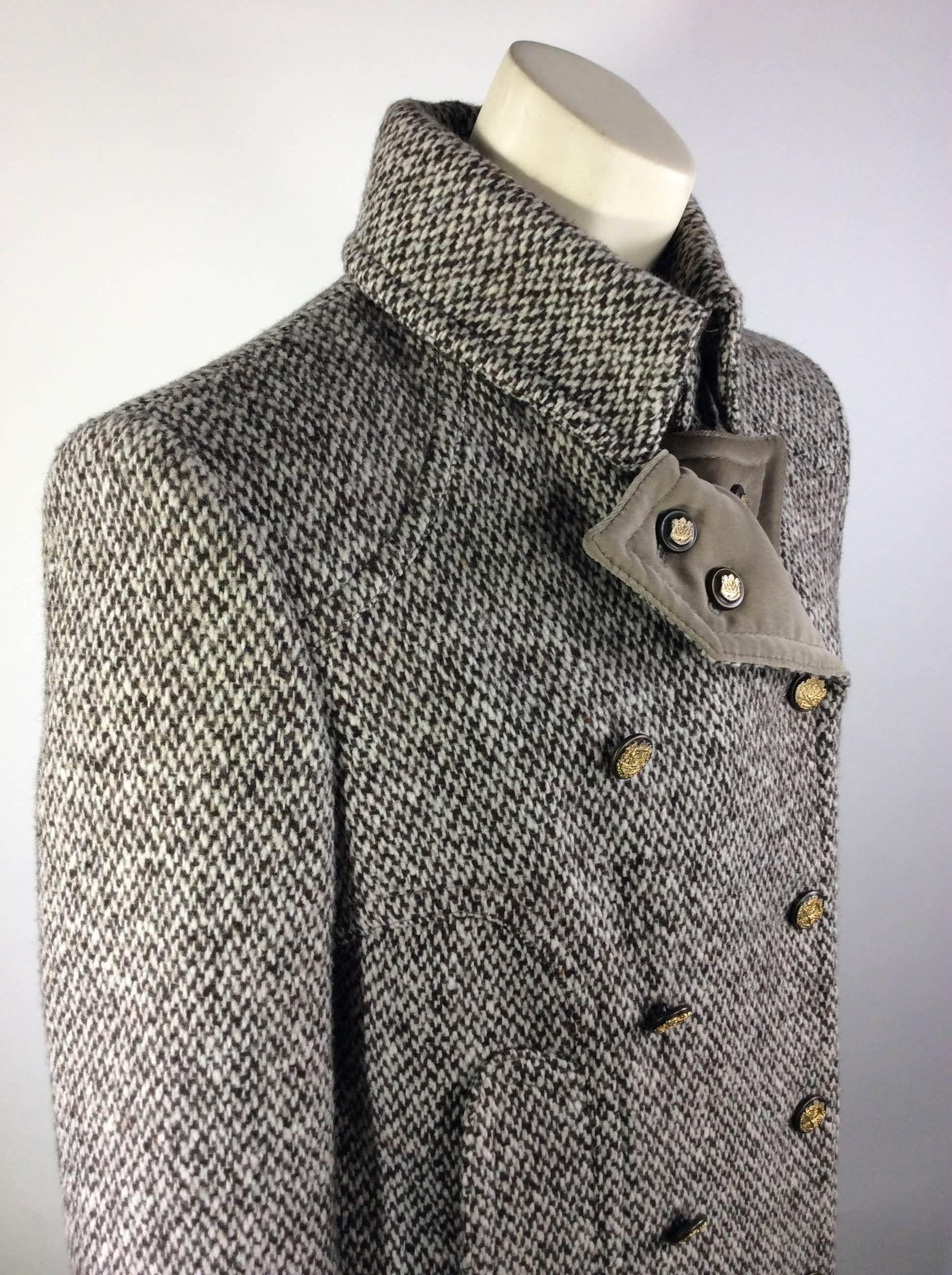 Tweed Military Style Jacket
Velvet on Cuffs and Collar Lining
Goldtone Logo Buttons 
Cheetah Print Interior 
Single Pocket on Either Side 