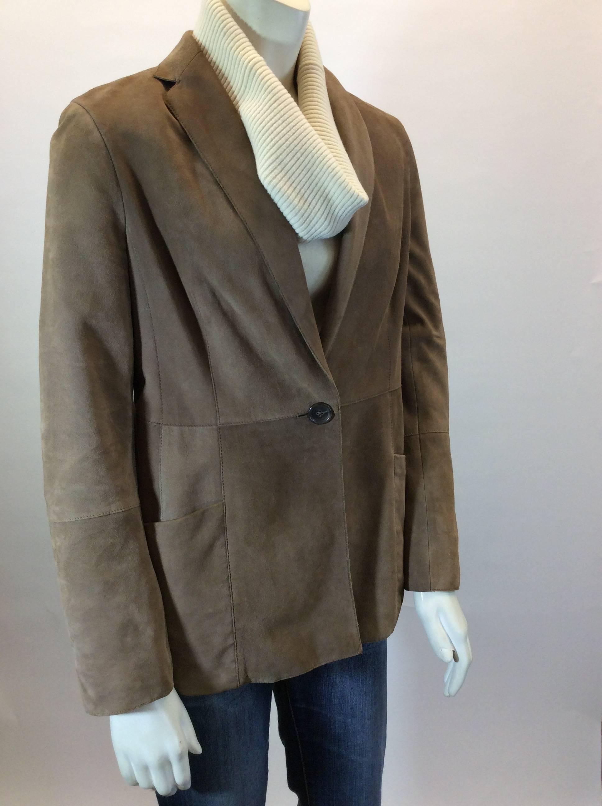 100% Goat Suede
Toffee Brown 
Single Button on Front for Closure
Single Pocket on Either side
US Size 8