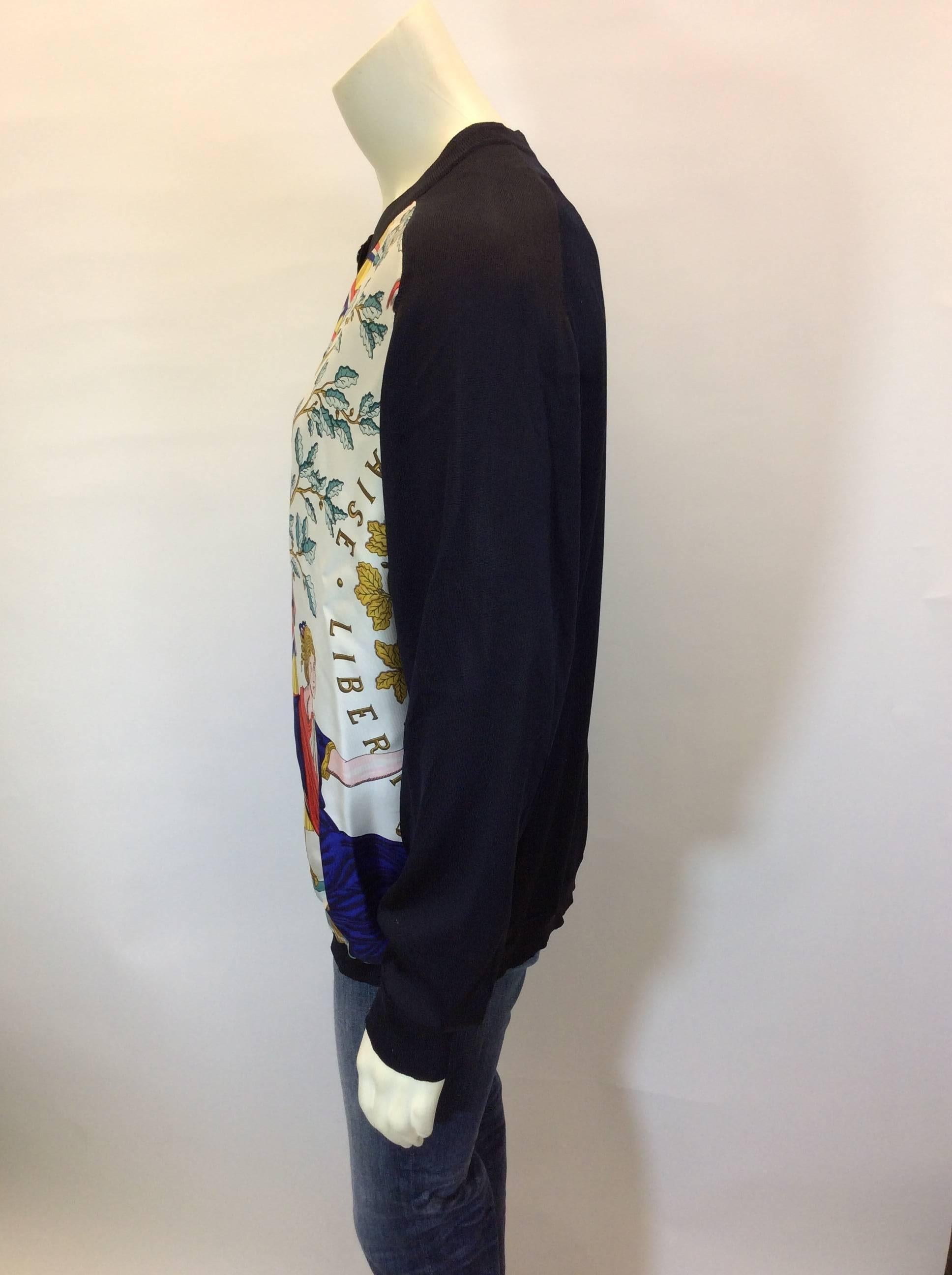 Printed Silk Cardigan
7 button front closure
Features silk Hermes printed panels on front
Ribbed cuff and waistband
Size 44 (equates to US 12)
100% Silk