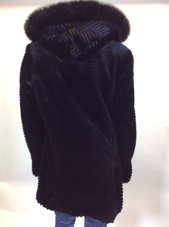 Neiman Marcus Exclusive Black Faux Fur Hooded Coat For Sale at 1stdibs