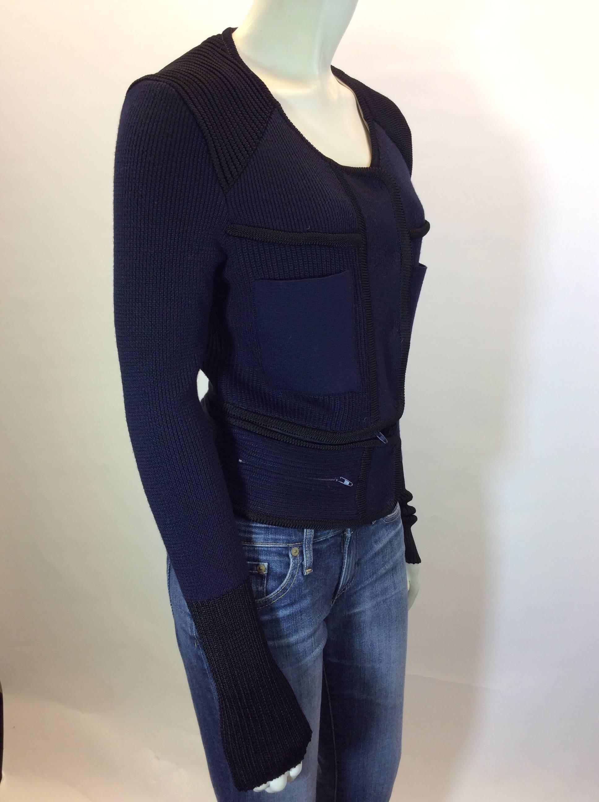 Navy and Black Cardigan
Zipper Removable Bottom Piece (32" x 5")
Snap Buttons up front for Closure
Single Pocket on Either Side
EU 40 
28" Inch Sleeve Length