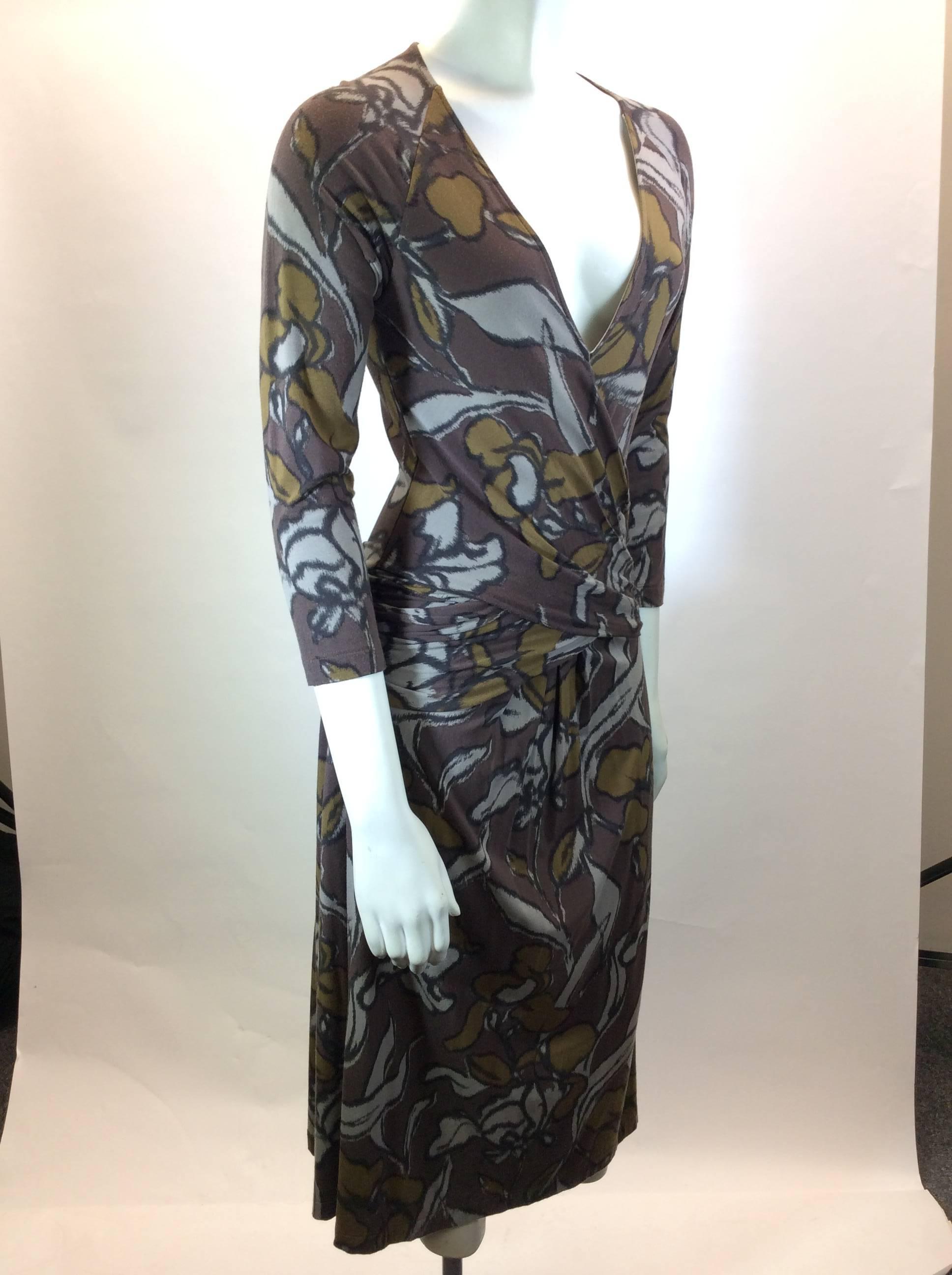 Brown and Grey Printed Dress
Wrap around tie at Back
Quarter Length Sleeves
EU Size 42
18.5" Inch Sleeve Length