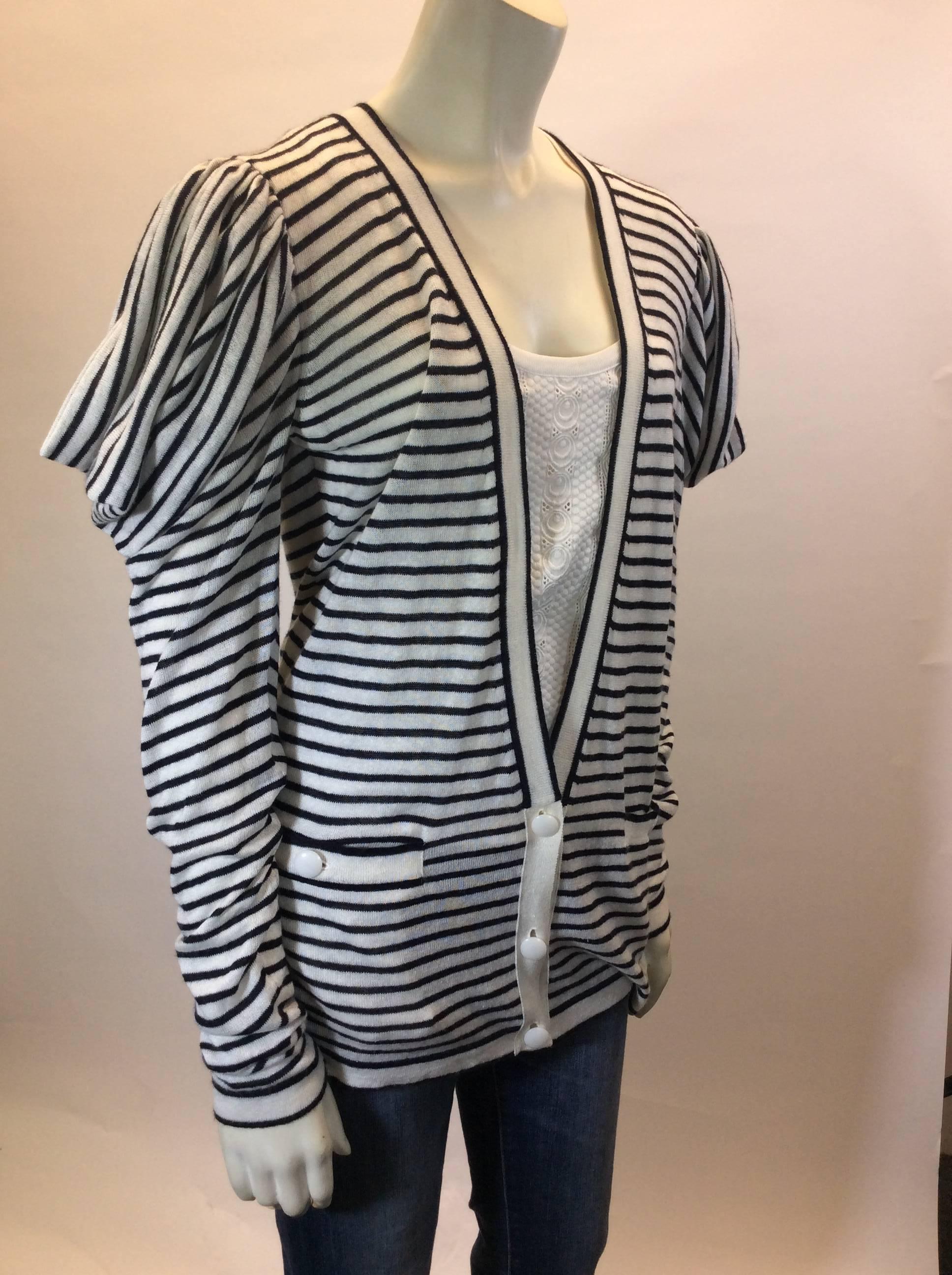 Brand New Stella McCartney Sweater
Blue and White Cashmere
Detail on Shoulders 
Buttons on front for Closure
Single Pocket on either side
29" Inch Sleeve Length