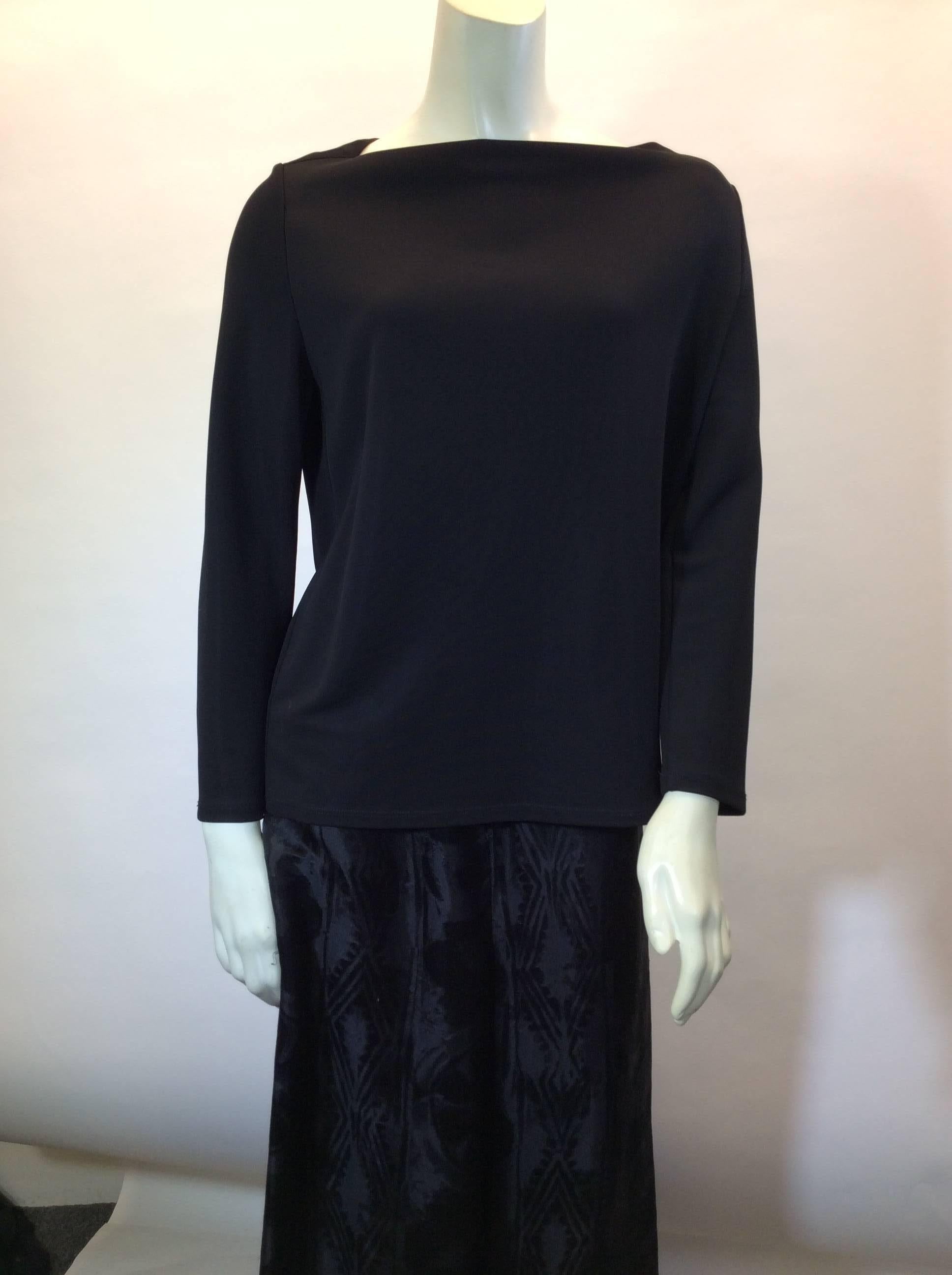 The Row Pant Set
Top is Viscose, Pants are Silk and Viscose
Size Medium
Long sleeve top and wide leg cropped pant