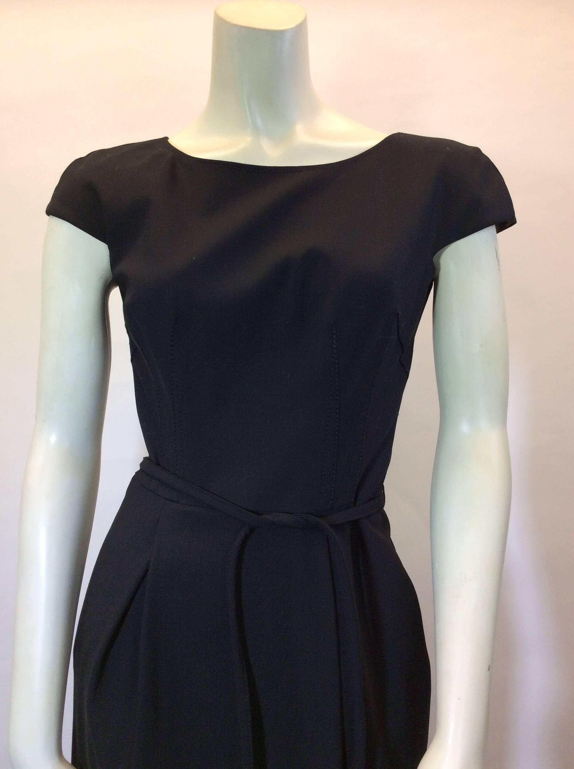 Dolce & Gabbana
Belted
Short sleeve, fitted 
Size 40
97% wool
Lined - Cupro & Spandex