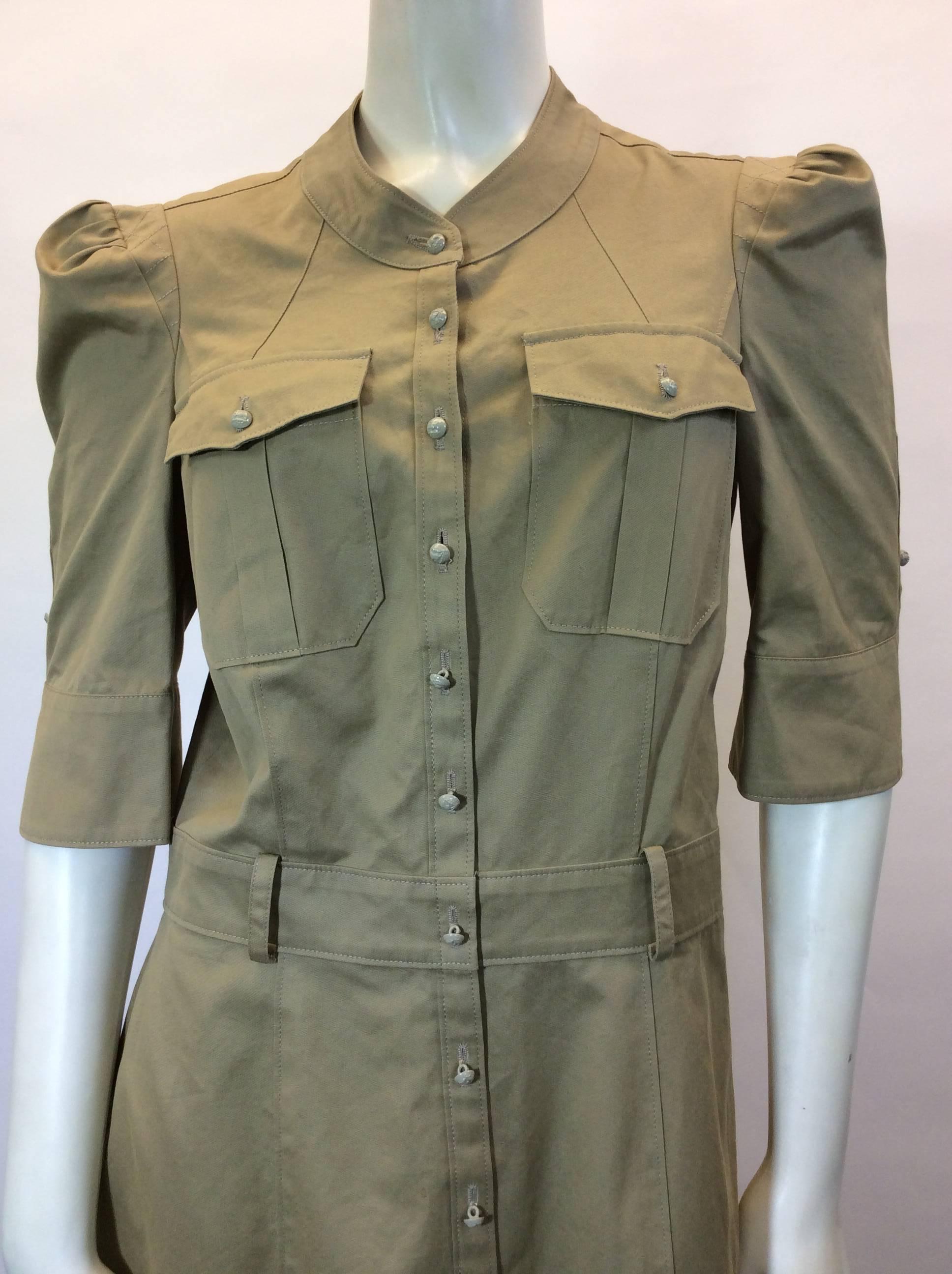 Balenciaga Buttondown Dress
Size Medium/ Size 40 
Two pockets on chest 
Tan small buttons 
Made in Italy 