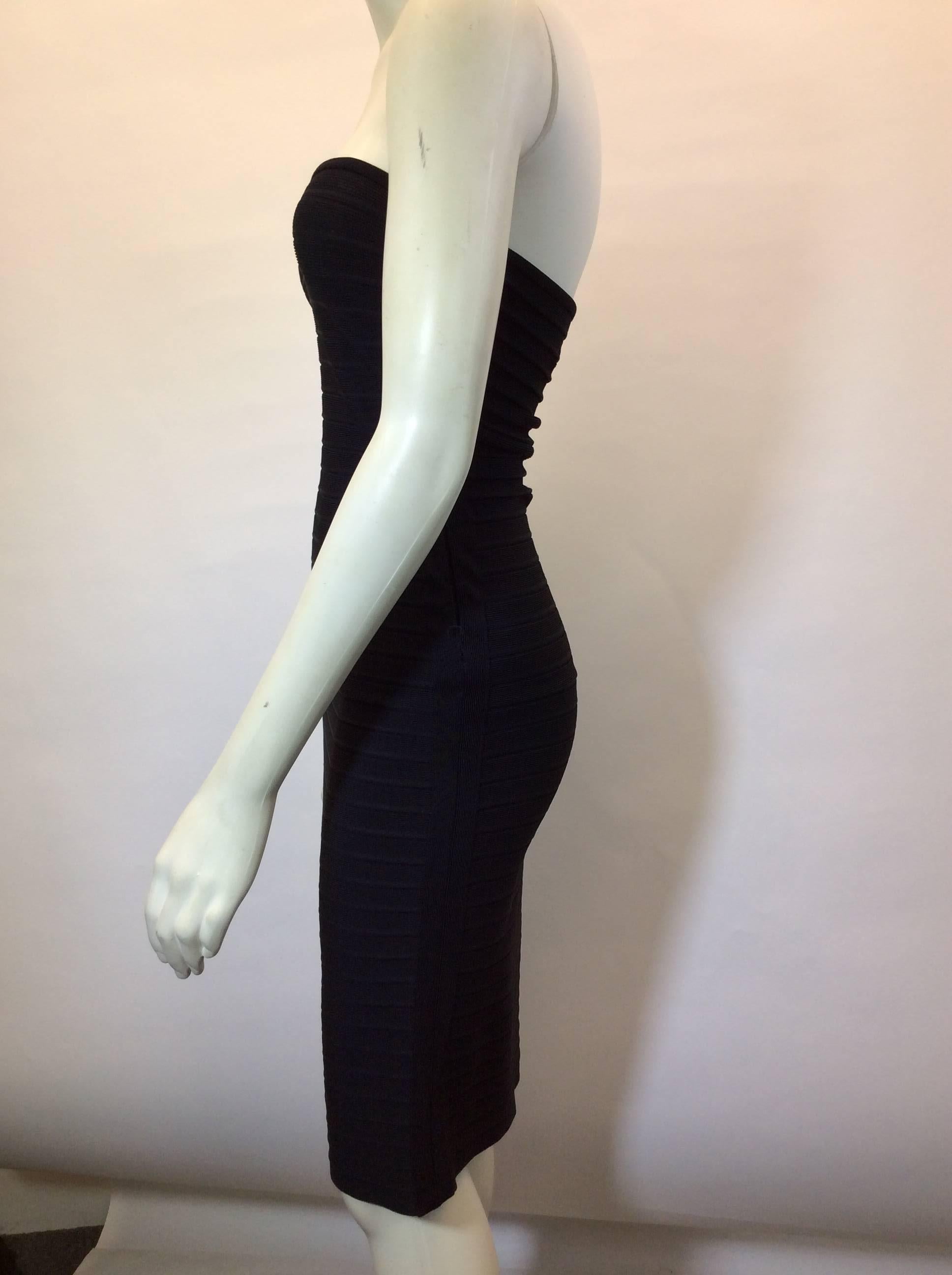 Herve Leger Dress
Fitted, Strapless
Size Small
Rayon, Nylon, Spandex
Side Zipper