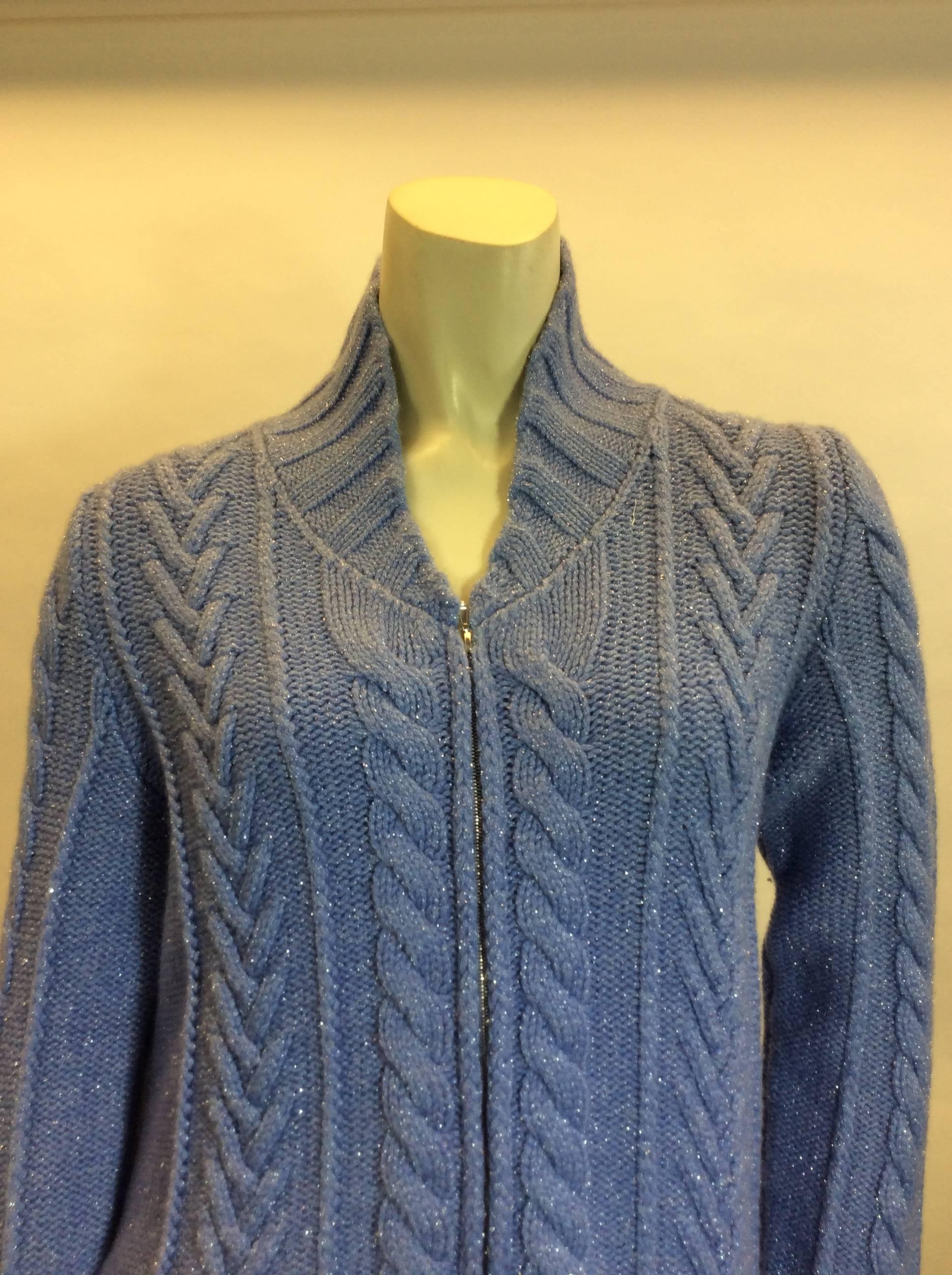 Leggiadro NWT Sweater
Original price: $1495
Periwinkle sweater with silver metallic
High collar
Size Medium
Made in NYC

