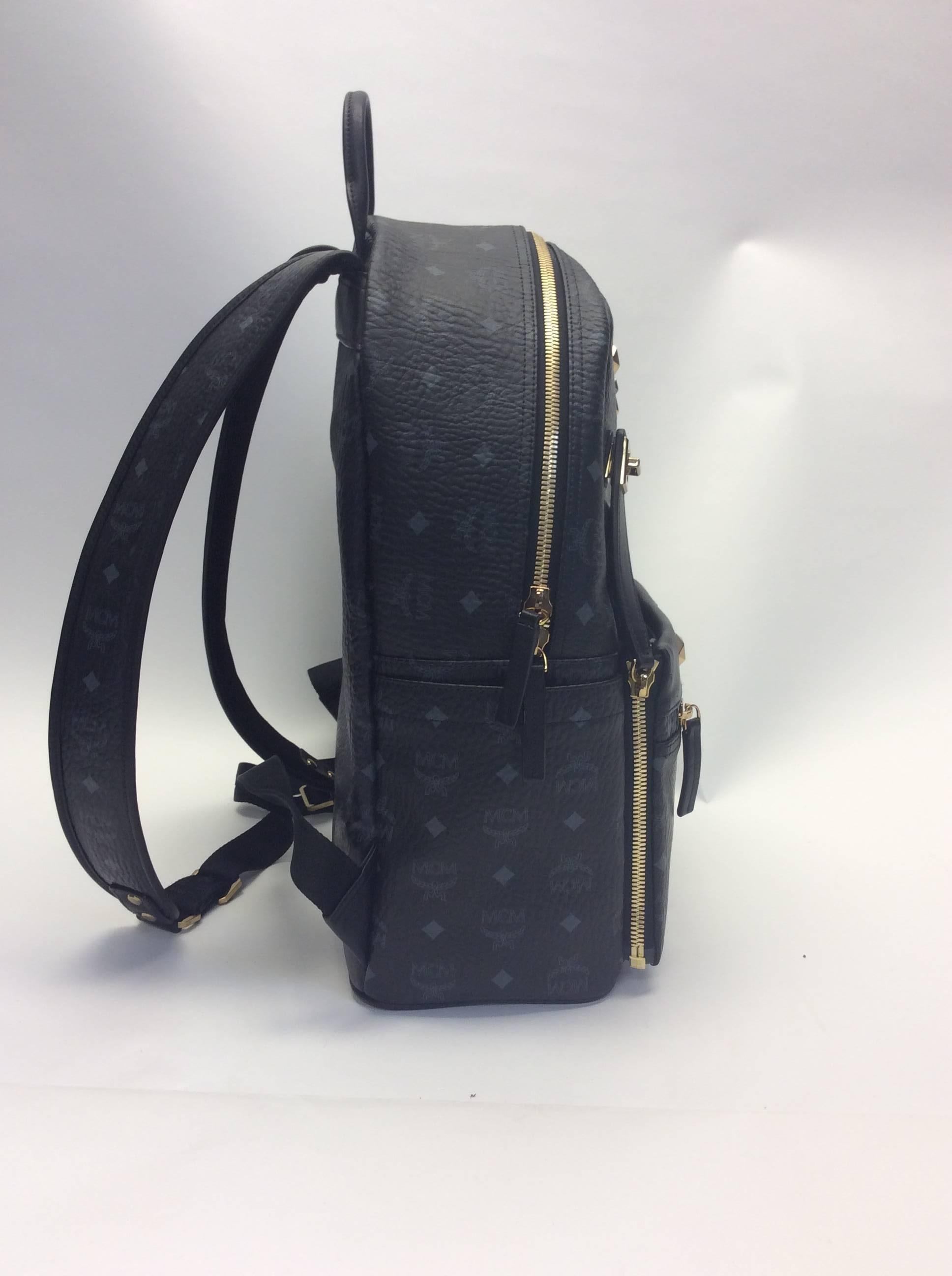 MCM Leather Logo Studded Black Backpack In New Condition For Sale In Narberth, PA