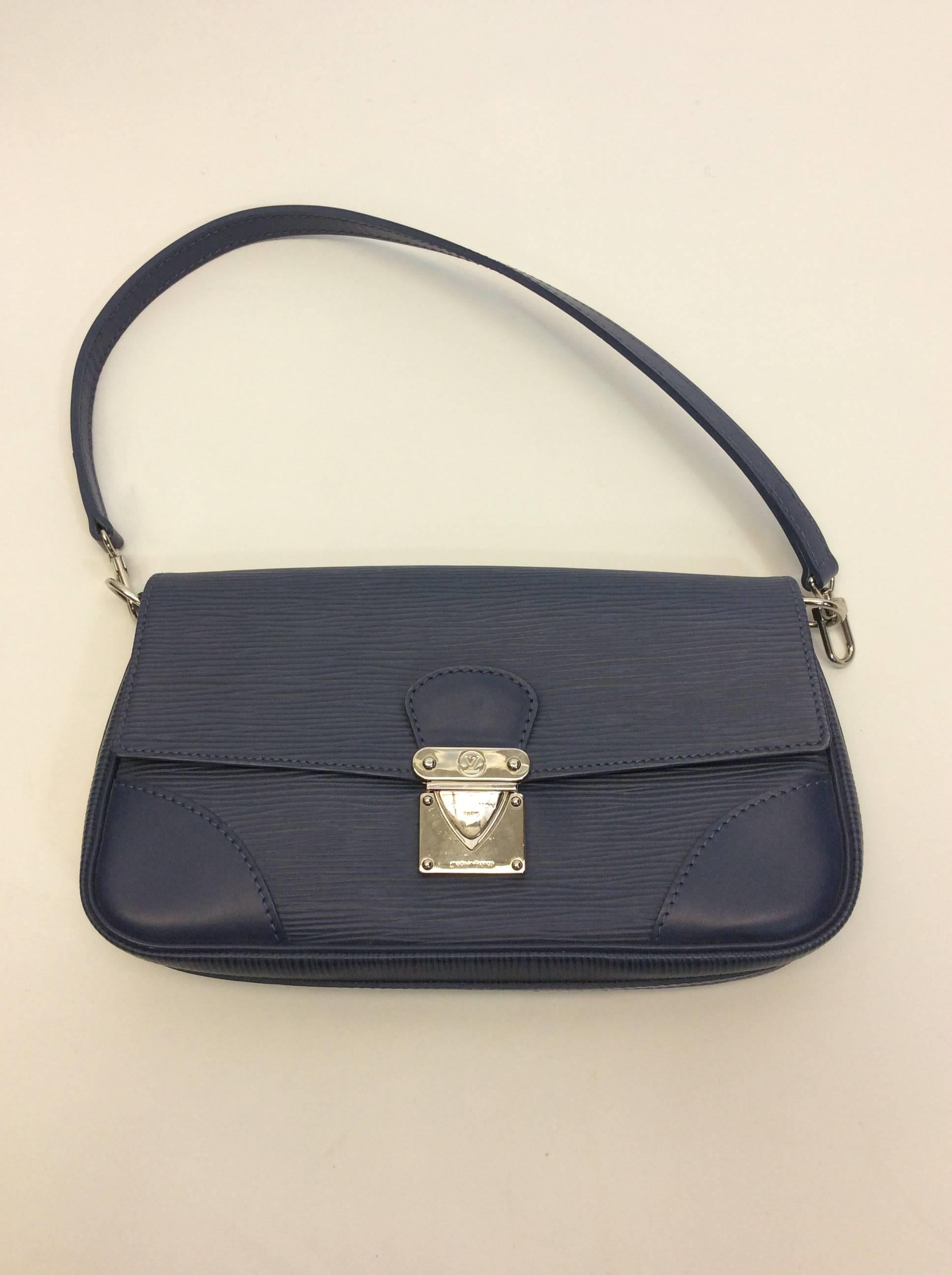 Louis Vuitton Epi Blue Leather Clutch
Epi leather exterior, lined interior
$399
Made in France
Silver hardware
Clasp closure
10 X 5 X 2